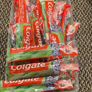 25- Colgate Toothbrush  - Red and Green